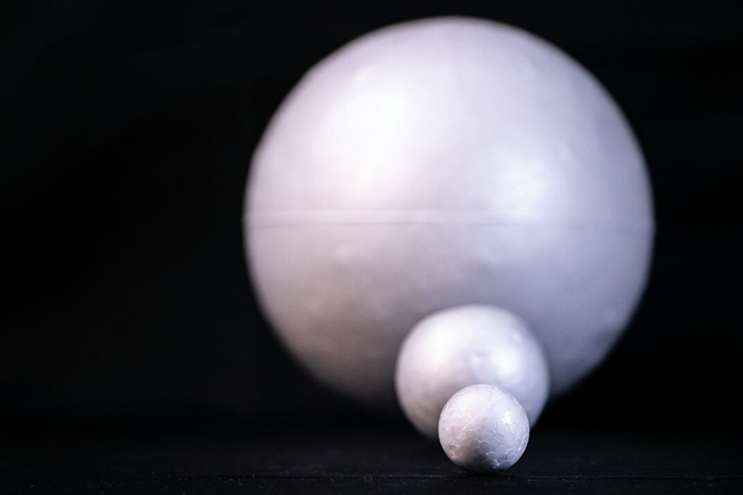 Studio set lit with soft key light and coloured backlights
